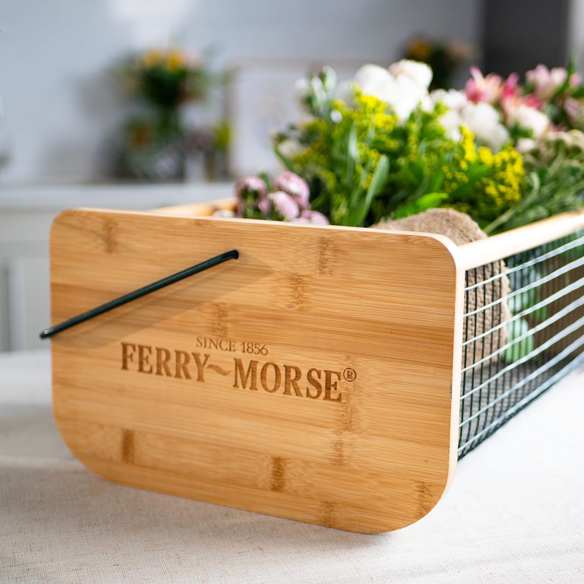 Ferry-Morse harvest basket with flowers and peat pots inside them